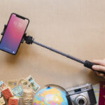 hand-holding-hi-tech-smartphone-monopod